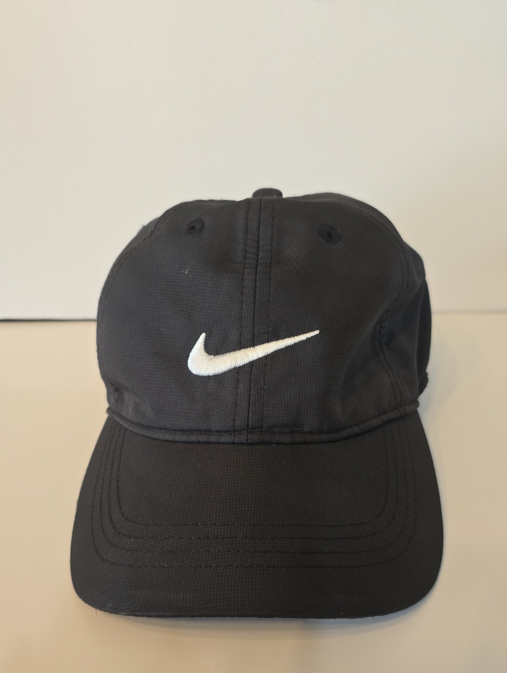 Nike Black Cap with White Swoosh Logo